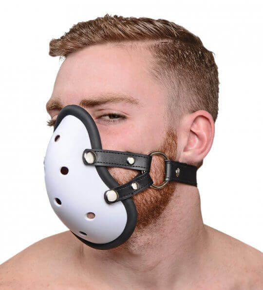 Front view of a man wearing an athletic cup muzzle. White with venting holes.